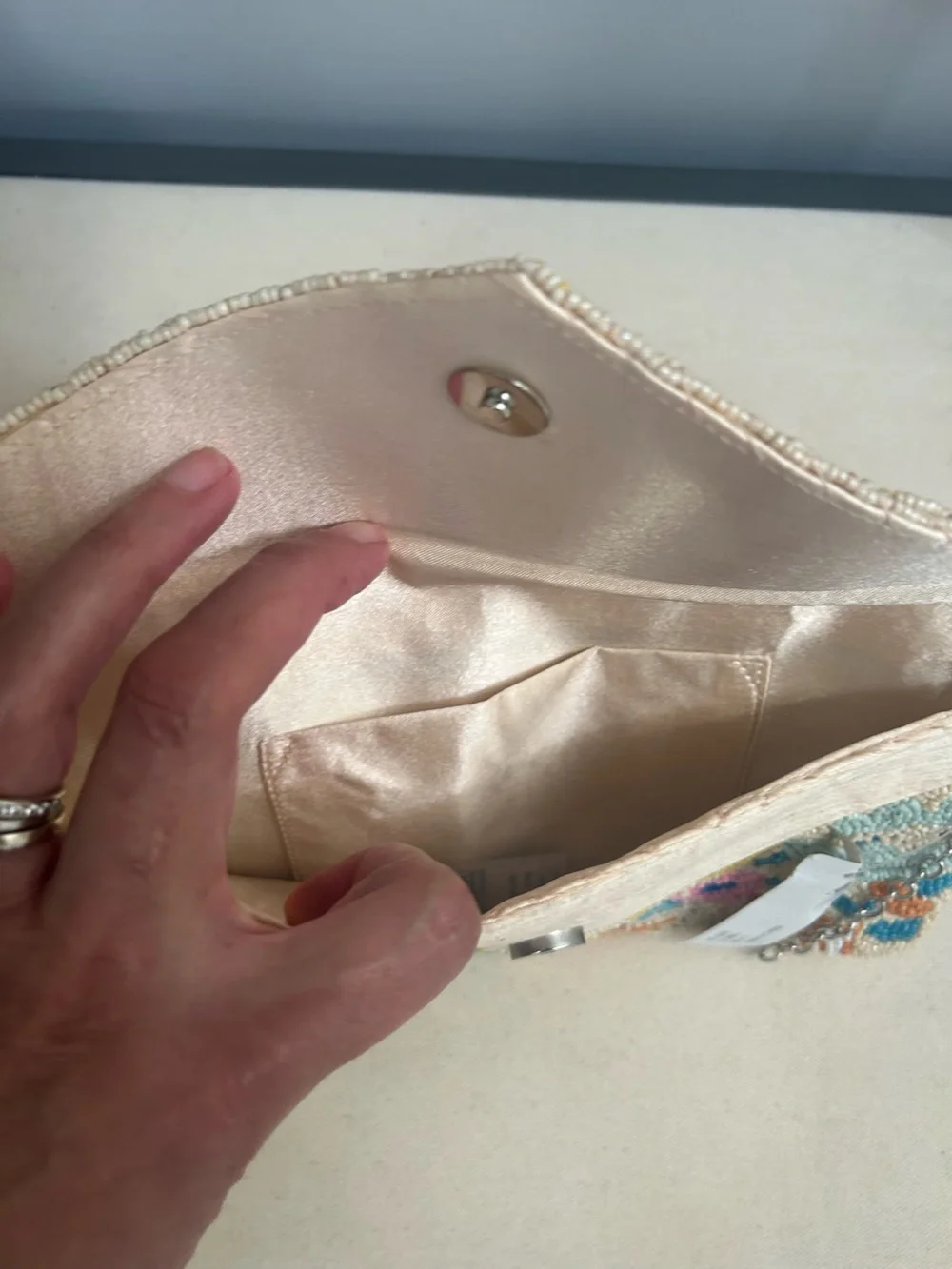 NWT SOL and MER beaded clutch.